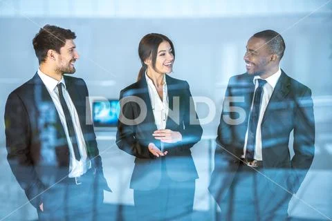 The smile business people stand over the window Stock Photos