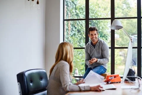 Smile, computer and creative team in office for discussion, project management Stock Photos