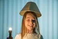 The smile girl on the background of a lamp Photo