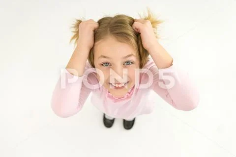 The smile girl hold her hair. View from above Stock Photos