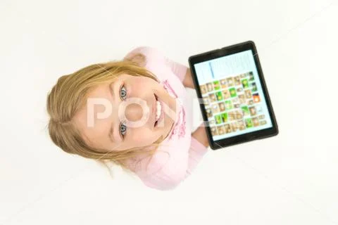 The smile girl stand with a tablet. View from above Stock Photos