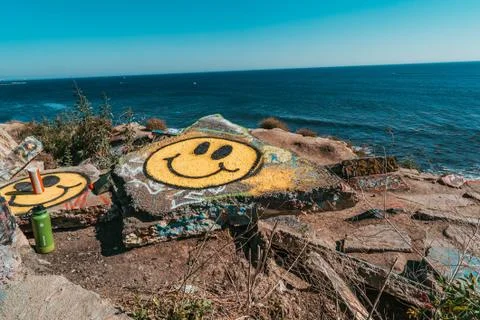 Smile Graffiti on the rock Stock Photos