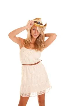 Smile hold hat down Stock Photos