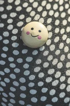 Smile icon on textile surface with points. Smile icon on textile surface w... Stock Photos