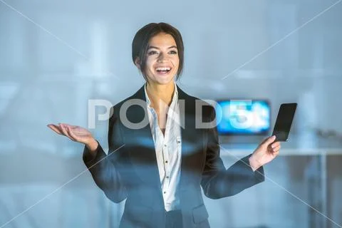 The smile lady stand with the phone over the window Stock Photos