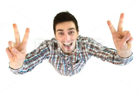 The smile man show two finger on the white background. View from above Stock Photos