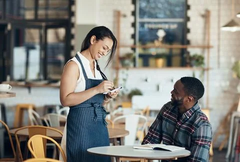 Smile, server and man at cafe with notepad, customer order and menu options.. Foto stock