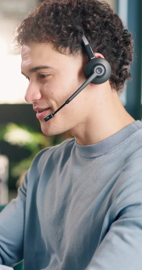 Smile, support and man with headset in agency for customer service or online Stock Footage 340602162