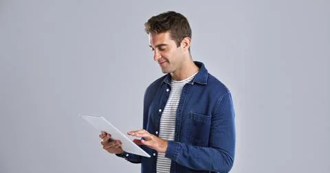Smile, system and tablet with tech guru in studio for programming or software Stock Photos