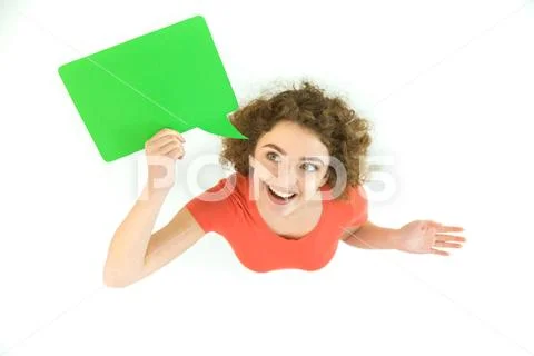 The smile woman stand with the green dialog sign. View from above Stock Photos