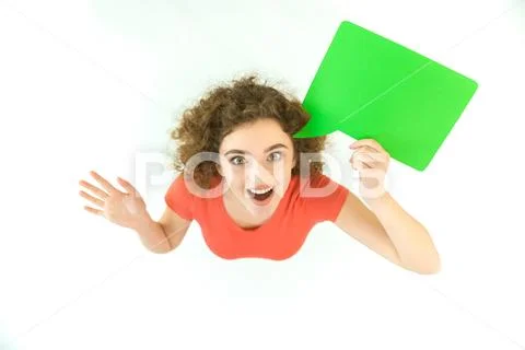 The smile woman stand with the green dialog sign. View from above Stock Photos