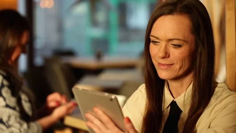 Smile woman using tablet in the cafe Stock Footage 72316545