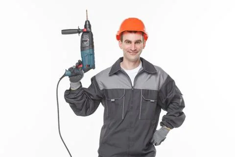 Smile worker with drill Stock Photos