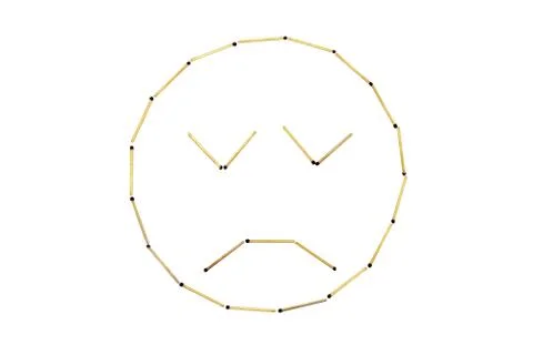 Smiley face Discontent is made out of matches Stock Photos