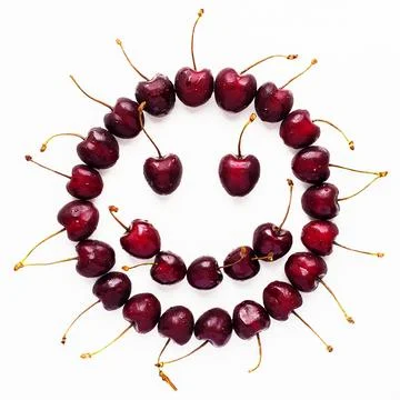 The smiley face is made of cherries Stock Photos