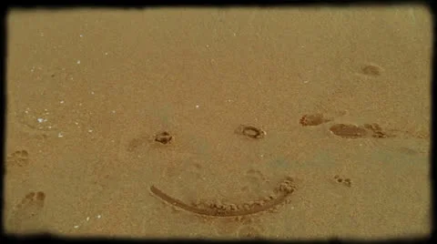Smiley Face On Sand Washed Away 8mm Stock Footage 24788468
