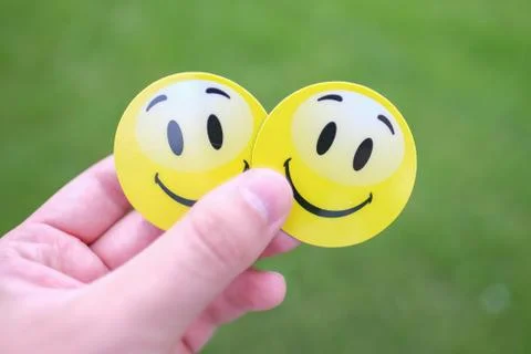 Smiley in hand Stock Photos