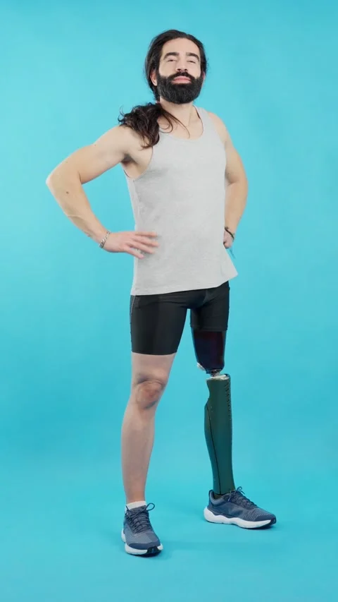 Smiley man standing with a leg prosthesis Stock Footage 239262842