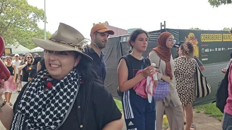SMILEY PROTESTERS MARCHING ON AUSTRALIA DAY ALSO KNOWN AS INVASION DAY Stock Footage 262846750