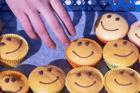 Smiley . Smiley cakes on table. Stock Photos