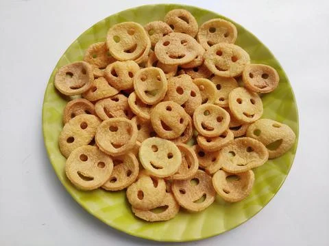 Smiley snacks on a plate Фото
