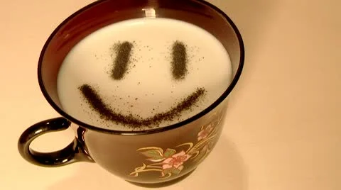 Smilie,character in a cup of milk. Stock Footage 8990541