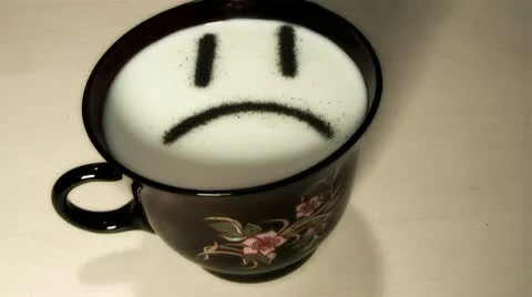 Smilie,character in a cup of milk. Stock Footage 8990634