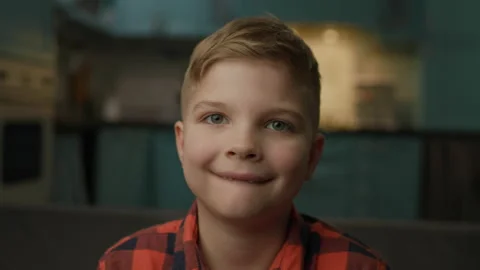 Smiling 7 Years Old Kid Portrait. Happy child's smile without baby teeth. Cute Video stock 227068628