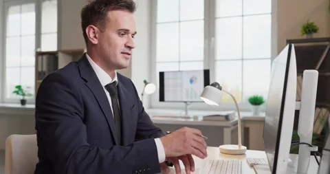 Smiling accountant analyst in office using computer, business audit and finance Stock Footage 331105756