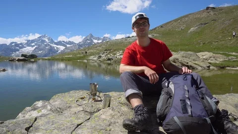 Smiling Active Young Man in Outdoors With Mountains in Background Stock Footage 93342130