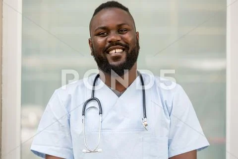 Smiling African American Doctor With Stethoscope Around His Neck. Portrait