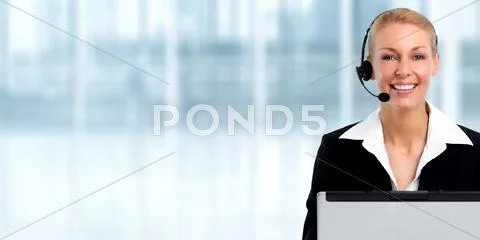 Smiling agent woman with headsets and laptop. Stock Photos