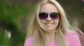 Smiling and singing friends dancing at summer party, reflection in sunglasses HD Footage