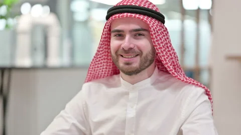 Smiling Arab Businessman Looking at Camera in Office Video stock 139413403