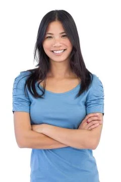 Smiling asian woman with arms crossed Stock Photos