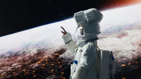 Smiling astronaut preparing to land on outer space planet, rotating 360 degrees Stock Photos