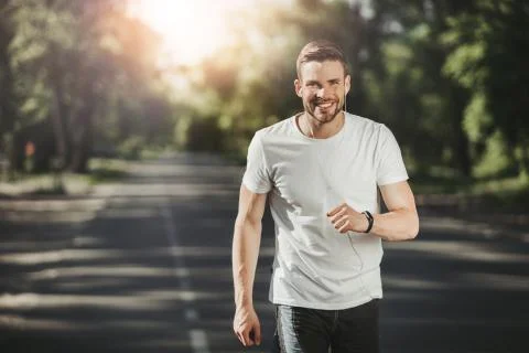 Smiling athlete preparing for competition Stock Photos