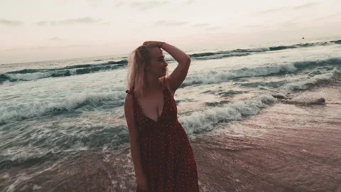 Smiling in the Beach at the Sunset Video stock 136023526