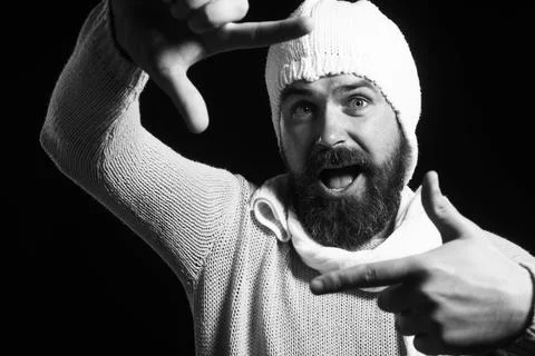 Smiling bearded framing face with hands. Happy man creating frame with finger Foto stock