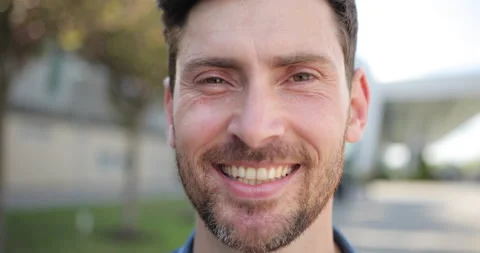 Smiling bearded man looking at camera. Happy confident handsome smart young Stock Footage 157559754