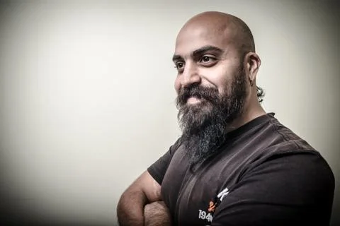 Smiling bearded man Stock Photos