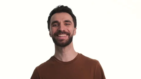 The smiling bearded man posing on camera. slow motion Stock Footage 150722168