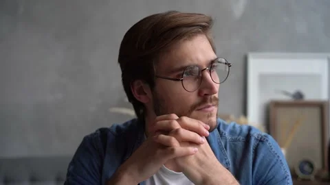 Smiling bearded millennial man looking at camera. Close up face view portrait Stock Footage 142875796