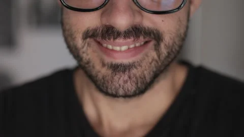 Smiling bearded millennial man. Positive concept. Closeup from out of focus Stock Footage 163043542