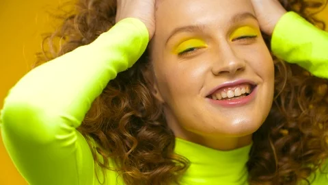 Smiling beautiful Professional model working at Studio, close up video of Woman Stock Footage 124988192