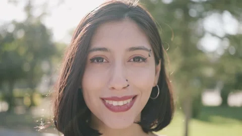 Smiling beauty is looking into camera Stock Footage 173422485