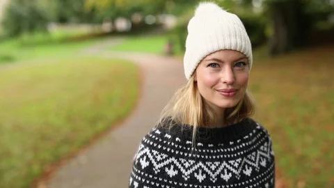 Smiling beauty in park Stock Footage 80958936