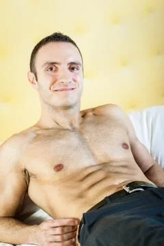 Smiling in bed Stock Photos