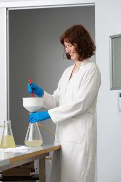 Smiling biologist performing lab analysis 스톡 사진