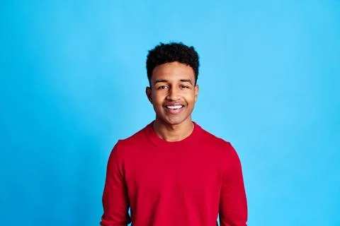 Smiling black man in studio Stock Photos